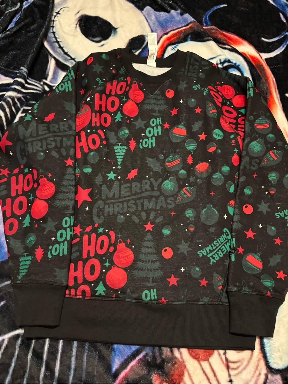 Fabletics Black Sweatshirt with Red and Teal Holiday Motifs